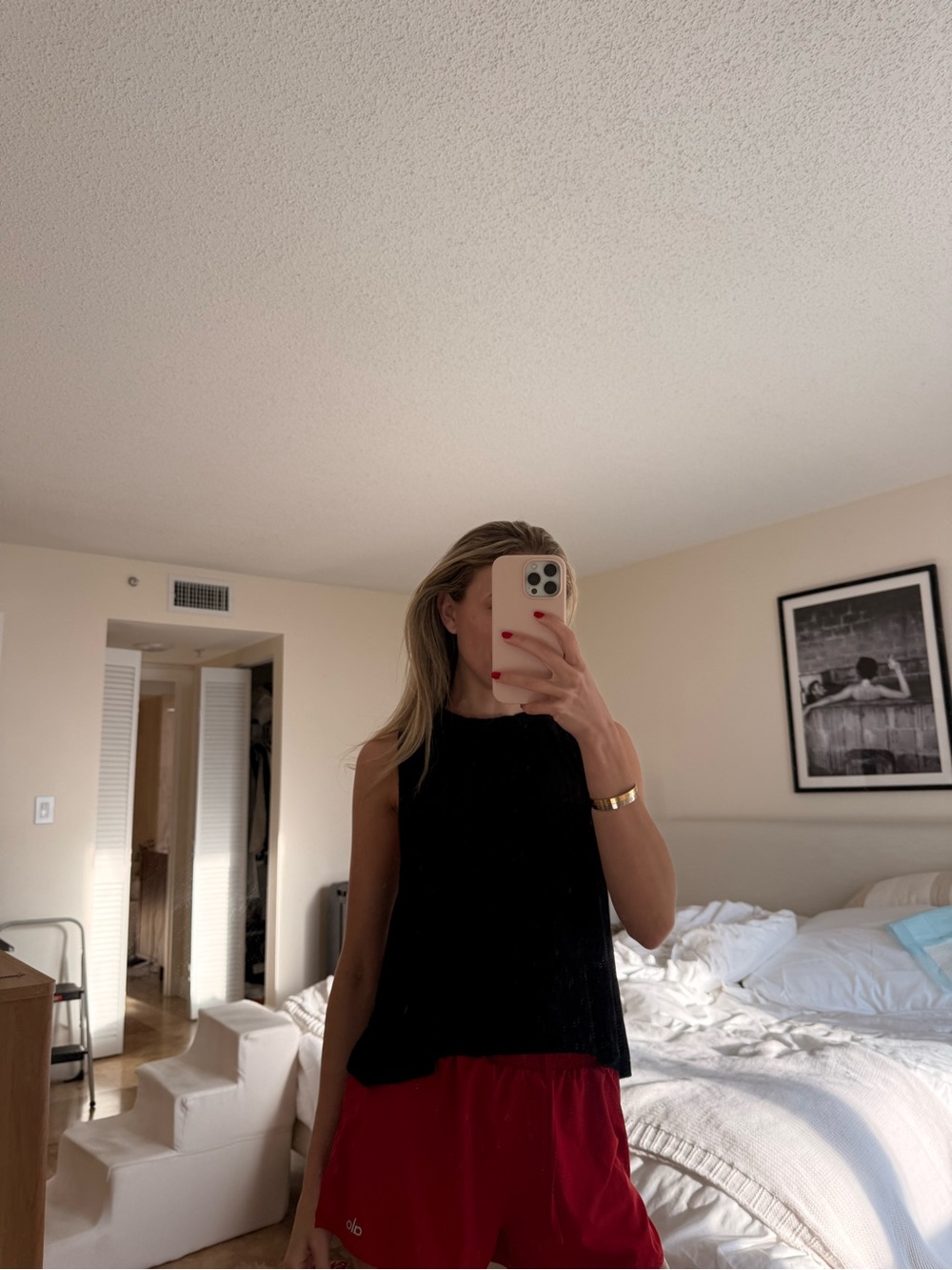 Carbon38 Black Sleeveless Tank with Red Shorts Look